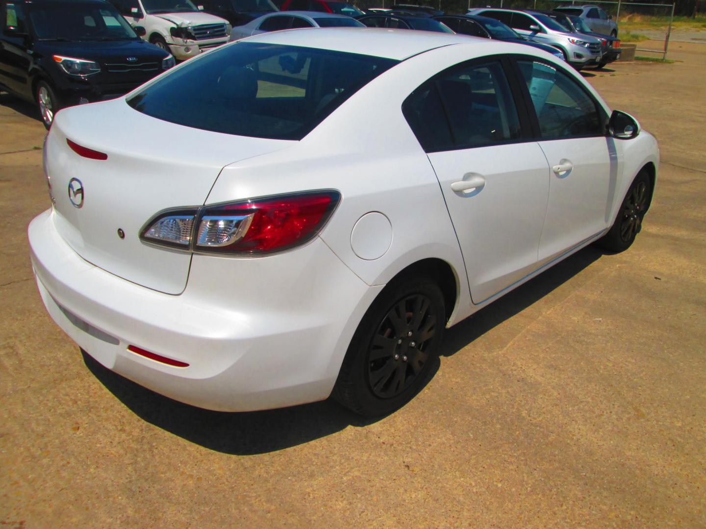 2013 WHITE Mazda MAZDA3 i SV MT 4-Door (JM1BL1TFXD1) with an 2.0L L4 DOHC 16V engine, 5-Speed Manual transmission, located at 1815 NE 28th St., Fort Worth, TX, 76106, (817) 625-6251, 32.795582, -97.333069 - Photo#4
