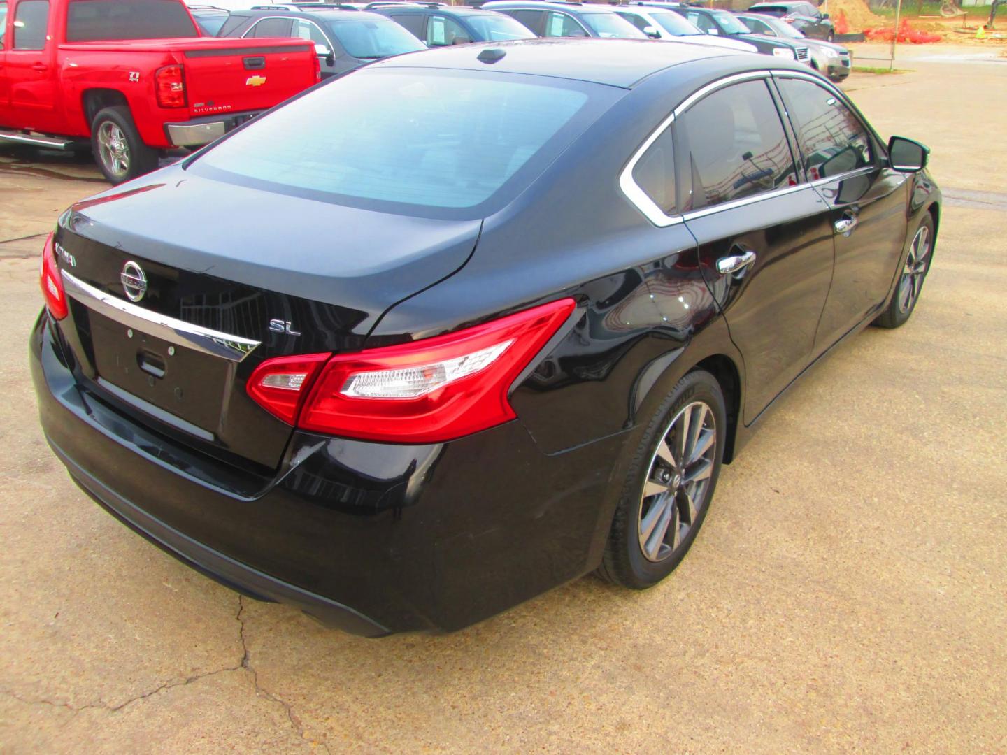 2017 BLACK Nissan Altima 2.5 S (1N4AL3AP2HC) with an 2.5L L4 DOHC 16V engine, CVT transmission, located at 1815 NE 28th St., Fort Worth, TX, 76106, (817) 625-6251, 32.795582, -97.333069 - Photo#4