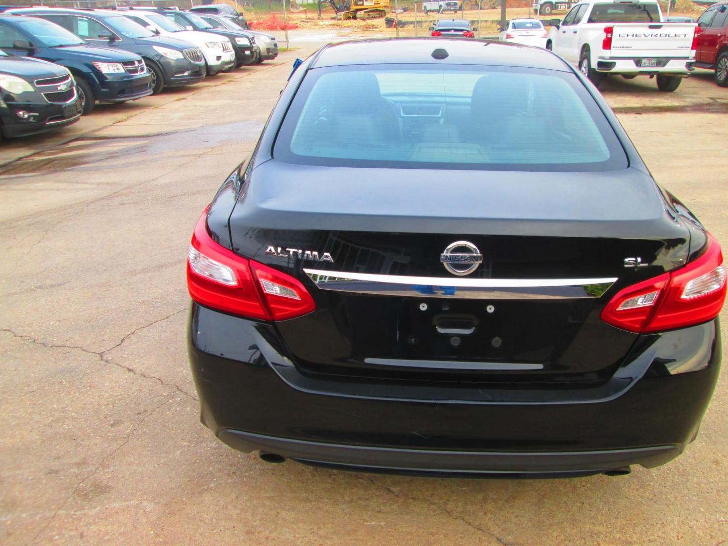 2017 BLACK Nissan Altima 2.5 S (1N4AL3AP2HC) with an 2.5L L4 DOHC 16V engine, CVT transmission, located at 1815 NE 28th St., Fort Worth, TX, 76106, (817) 625-6251, 32.795582, -97.333069 - Photo#5