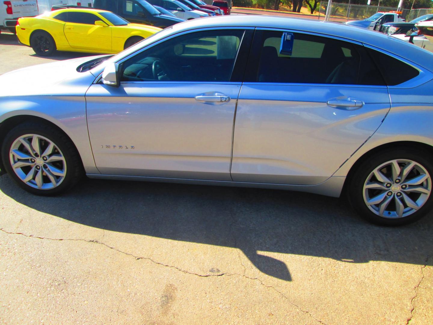2017 SILVER Chevrolet Impala LT (2G1105S31H9) with an 3.6L V6 DOHC 24V engine, 6A transmission, located at 1815 NE 28th St., Fort Worth, TX, 76106, (817) 625-6251, 32.795582, -97.333069- Photo#7
