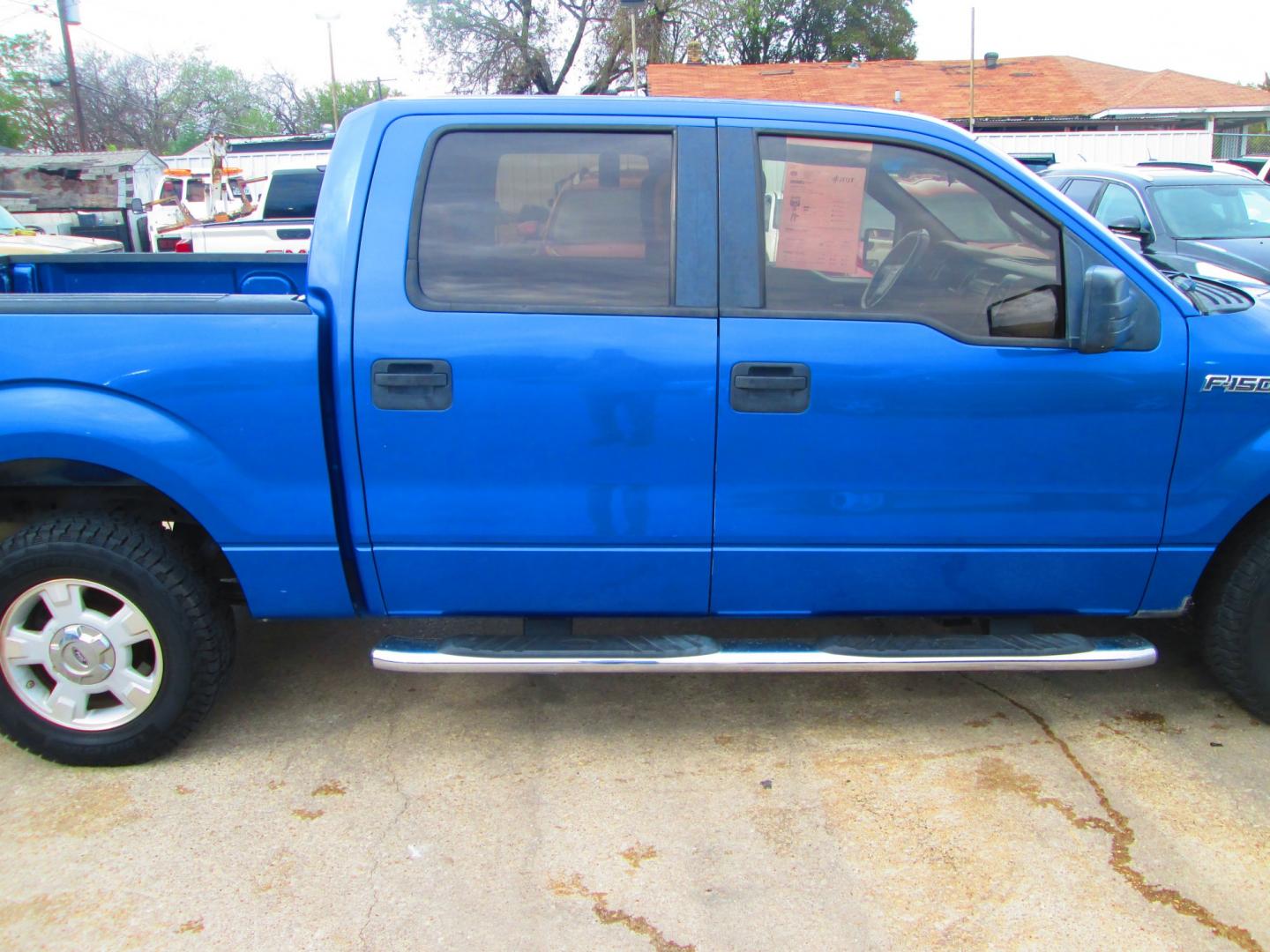 2009 BLUE Ford F-150 (1FTRW12W09F) with an 4.6L V8 OHC FFV engine, 4-Speed Automatic transmission, located at 1815 NE 28th St., Fort Worth, TX, 76106, (817) 625-6251, 32.795582, -97.333069- Photo#3