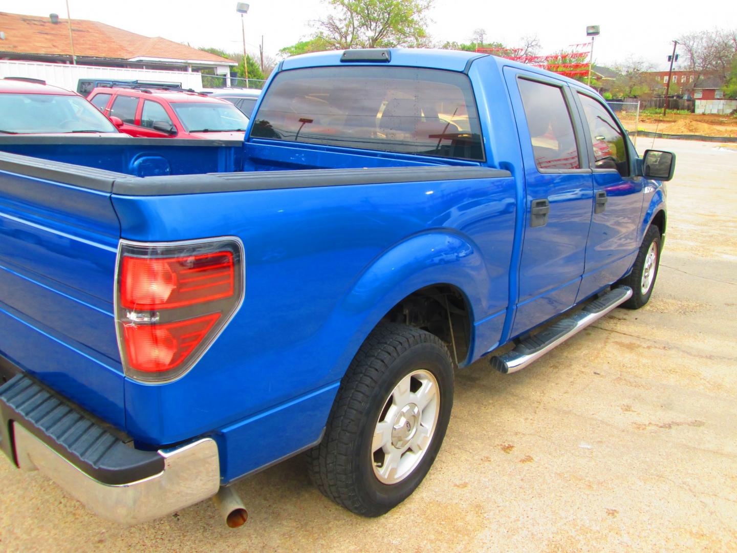 2009 BLUE Ford F-150 (1FTRW12W09F) with an 4.6L V8 OHC FFV engine, 4-Speed Automatic transmission, located at 1815 NE 28th St., Fort Worth, TX, 76106, (817) 625-6251, 32.795582, -97.333069- Photo#4