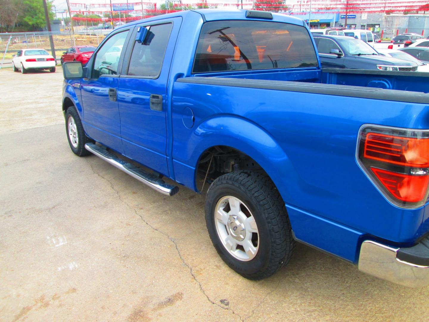 2009 BLUE Ford F-150 (1FTRW12W09F) with an 4.6L V8 OHC FFV engine, 4-Speed Automatic transmission, located at 1815 NE 28th St., Fort Worth, TX, 76106, (817) 625-6251, 32.795582, -97.333069- Photo#6
