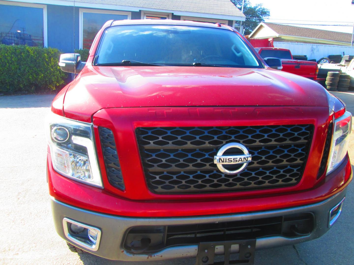 2017 RED Nissan Titan (1N6AA1E54HN) , located at 1815 NE 28th St., Fort Worth, TX, 76106, (817) 625-6251, 32.795582, -97.333069 - Photo#1