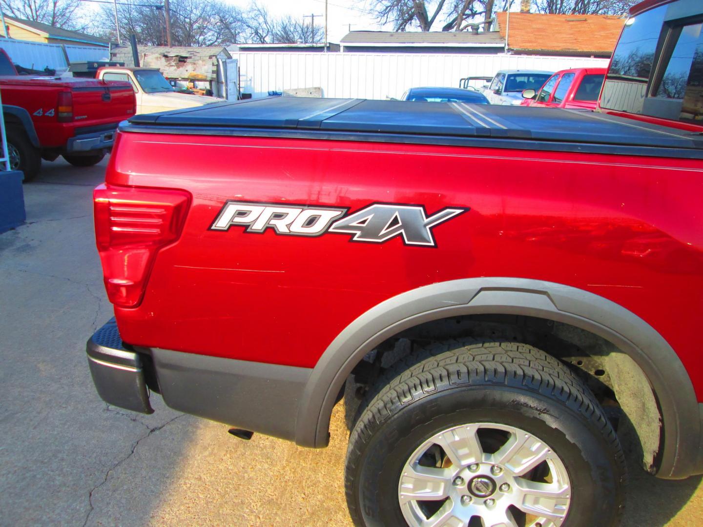 2017 RED Nissan Titan (1N6AA1E54HN) , located at 1815 NE 28th St., Fort Worth, TX, 76106, (817) 625-6251, 32.795582, -97.333069 - Photo#4