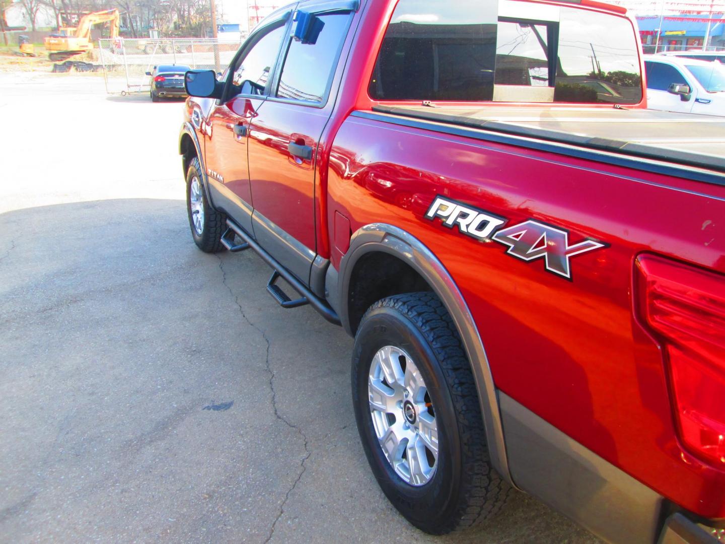 2017 RED Nissan Titan (1N6AA1E54HN) , located at 1815 NE 28th St., Fort Worth, TX, 76106, (817) 625-6251, 32.795582, -97.333069 - Photo#7