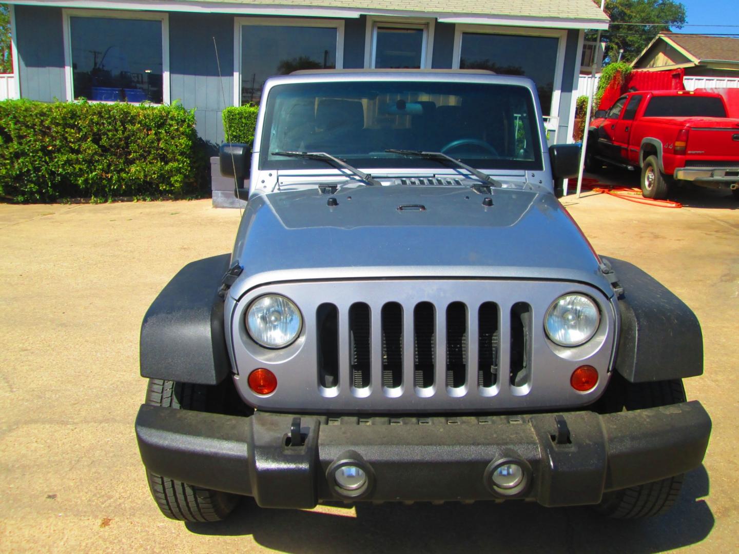 2013 SILVER Jeep Wrangler Sport 4WD (1C4GJWAG1DL) with an 3.6L V6 DOHC 24V FFV engine, located at 1815 NE 28th St., Fort Worth, TX, 76106, (817) 625-6251, 32.795582, -97.333069- Photo#1