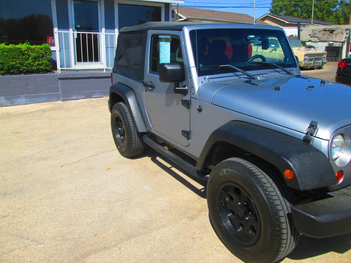 2013 SILVER Jeep Wrangler Sport 4WD (1C4GJWAG1DL) with an 3.6L V6 DOHC 24V FFV engine, located at 1815 NE 28th St., Fort Worth, TX, 76106, (817) 625-6251, 32.795582, -97.333069- Photo#2