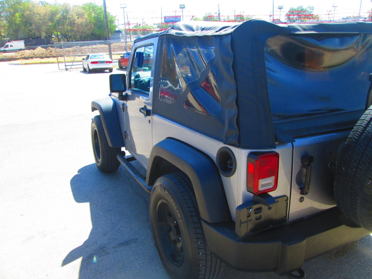 2013 SILVER Jeep Wrangler Sport 4WD (1C4GJWAG1DL) with an 3.6L V6 DOHC 24V FFV engine, located at 1815 NE 28th St., Fort Worth, TX, 76106, (817) 625-6251, 32.795582, -97.333069- Photo#6