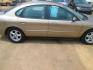 2003 GOLD /TAN Ford Taurus SES FFV (1FAFP552X3G) with an 3.0L V6 OHV 12V FFV engine, 4-Speed Automatic Overdrive transmission, located at 1815 NE 28th St., Fort Worth, TX, 76106, (817) 625-6251, 32.795582, -97.333069 - Photo#3