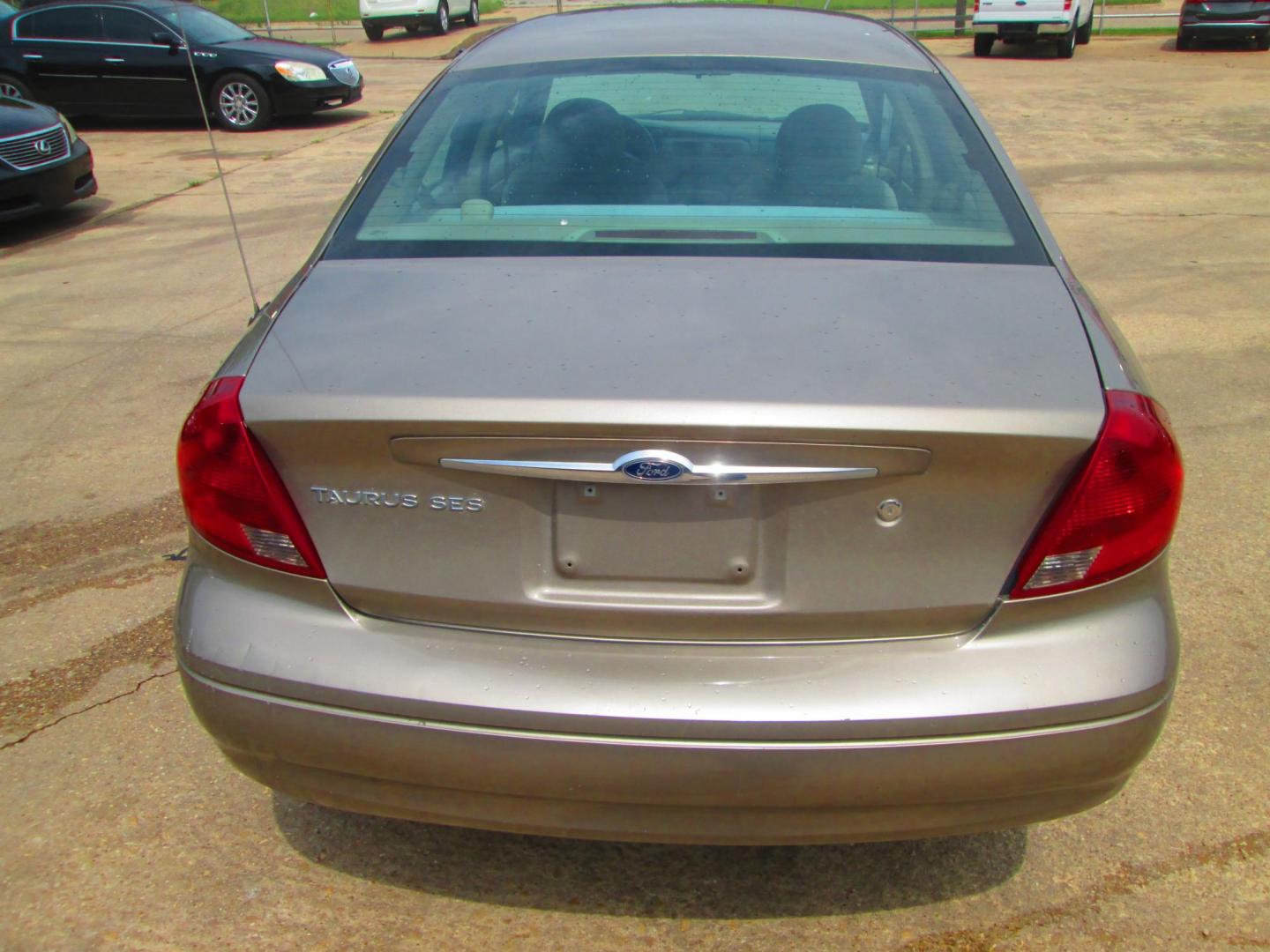 2003 GOLD /TAN Ford Taurus SES FFV (1FAFP552X3G) with an 3.0L V6 OHV 12V FFV engine, 4-Speed Automatic Overdrive transmission, located at 1815 NE 28th St., Fort Worth, TX, 76106, (817) 625-6251, 32.795582, -97.333069 - Photo#5