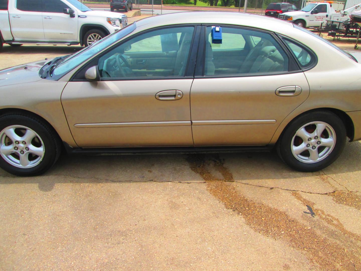 2003 GOLD /TAN Ford Taurus SES FFV (1FAFP552X3G) with an 3.0L V6 OHV 12V FFV engine, 4-Speed Automatic Overdrive transmission, located at 1815 NE 28th St., Fort Worth, TX, 76106, (817) 625-6251, 32.795582, -97.333069 - Photo#7