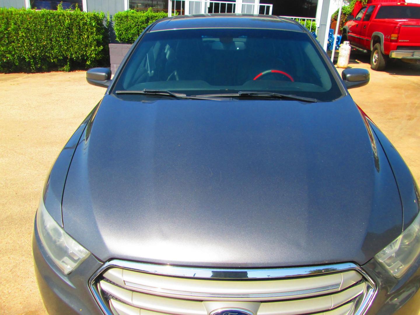 2014 GRAY Ford Taurus SEL FWD (1FAHP2E80EG) with an 3.5L V6 DOHC 24V engine, 6-Speed Automatic transmission, located at 1815 NE 28th St., Fort Worth, TX, 76106, (817) 625-6251, 32.795582, -97.333069 - Photo#1