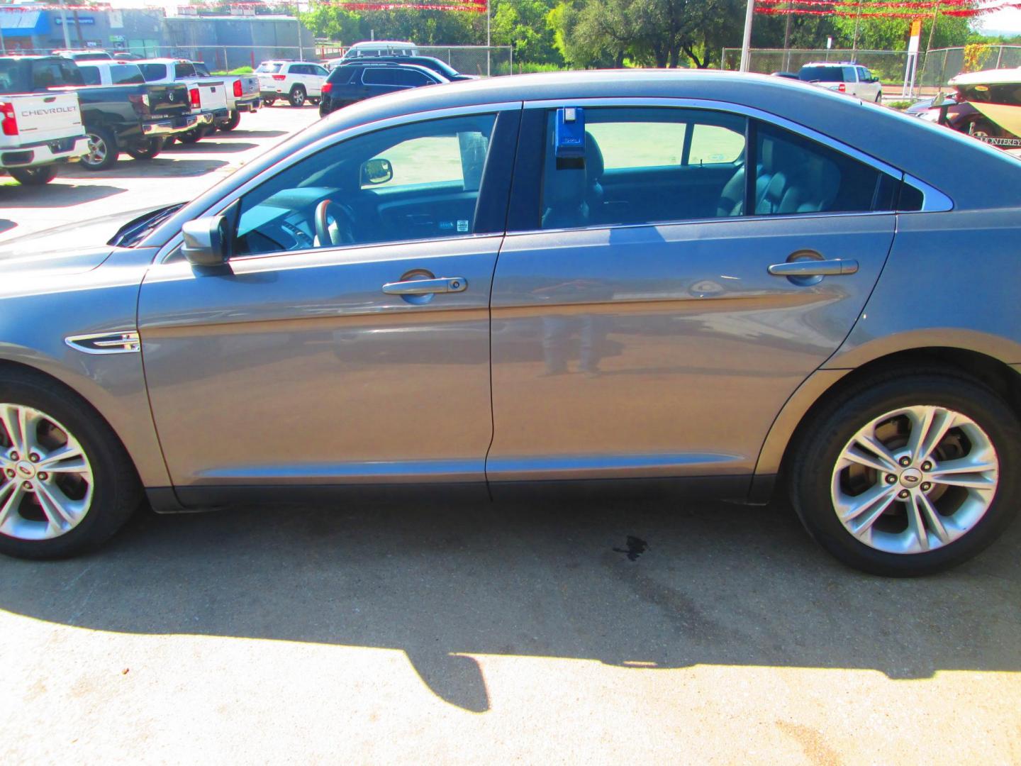 2014 GRAY Ford Taurus SEL FWD (1FAHP2E80EG) with an 3.5L V6 DOHC 24V engine, 6-Speed Automatic transmission, located at 1815 NE 28th St., Fort Worth, TX, 76106, (817) 625-6251, 32.795582, -97.333069 - Photo#7