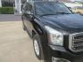 2015 BLACK GMC Yukon SLT 4WD (1GKS2BKC0FR) with an 5.3L V8 OHV 16V FFV engine, 6-Speed Automatic transmission, located at 1815 NE 28th St., Fort Worth, TX, 76106, (817) 625-6251, 32.795582, -97.333069 - Photo#2