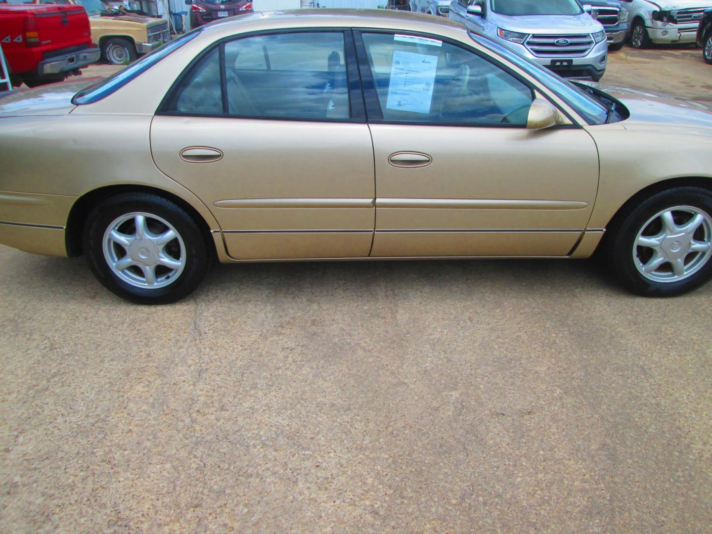 2004 GOLD Buick Regal LS (2G4WB52K341) with an 3.8L V6 OHV 12V engine, 4-Speed Automatic Overdrive transmission, located at 1815 NE 28th St., Fort Worth, TX, 76106, (817) 625-6251, 32.795582, -97.333069 - Photo#3