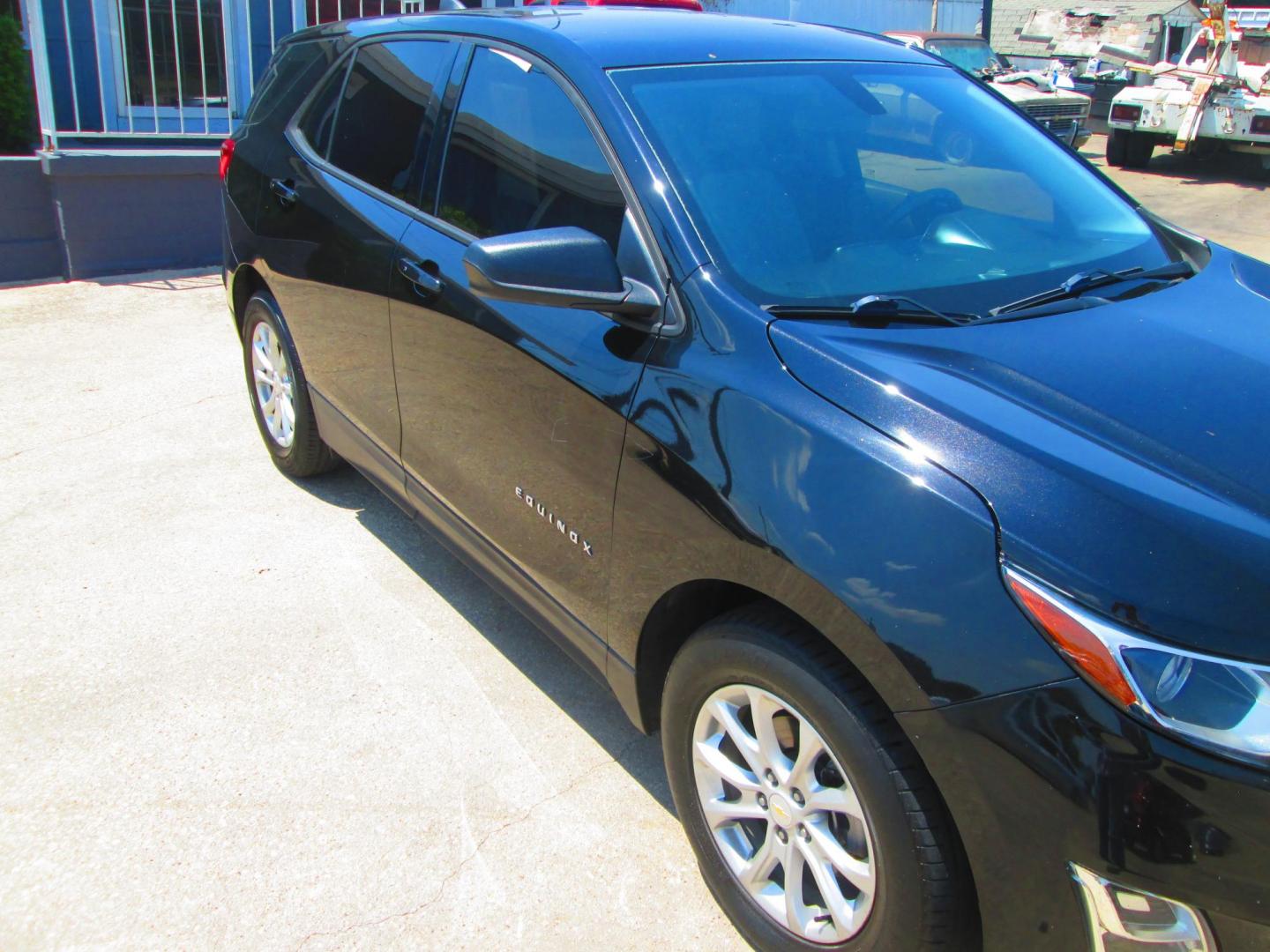 2018 BLACK Chevrolet Equinox LS 2WD (2GNAXHEV2J6) with an 1.5L L4 DIR DOHC 16V TURBO engine, 6A transmission, located at 1815 NE 28th St., Fort Worth, TX, 76106, (817) 625-6251, 32.795582, -97.333069 - Photo#2