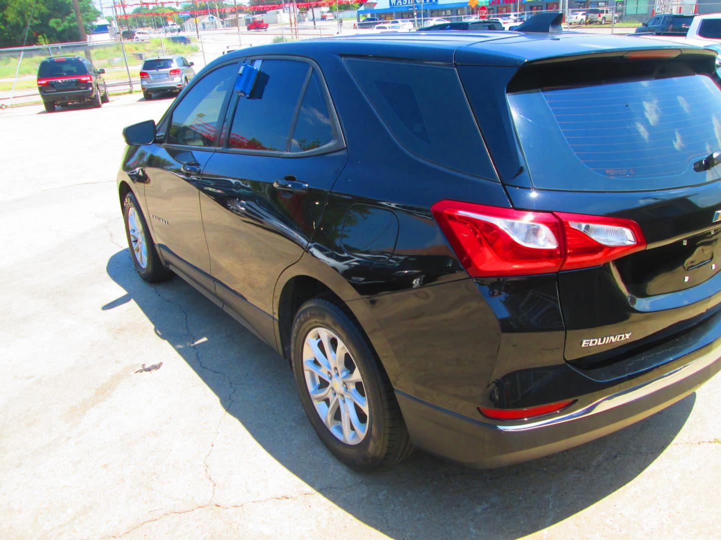 2018 BLACK Chevrolet Equinox LS 2WD (2GNAXHEV2J6) with an 1.5L L4 DIR DOHC 16V TURBO engine, 6A transmission, located at 1815 NE 28th St., Fort Worth, TX, 76106, (817) 625-6251, 32.795582, -97.333069 - Photo#6