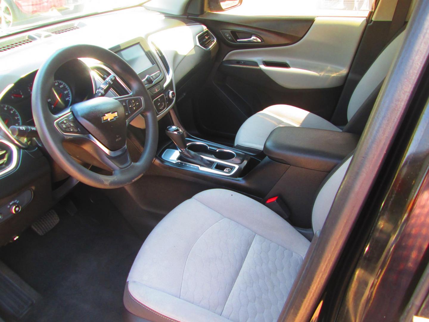 2018 BLACK Chevrolet Equinox LS 2WD (2GNAXHEV2J6) with an 1.5L L4 DIR DOHC 16V TURBO engine, 6A transmission, located at 1815 NE 28th St., Fort Worth, TX, 76106, (817) 625-6251, 32.795582, -97.333069 - Photo#9