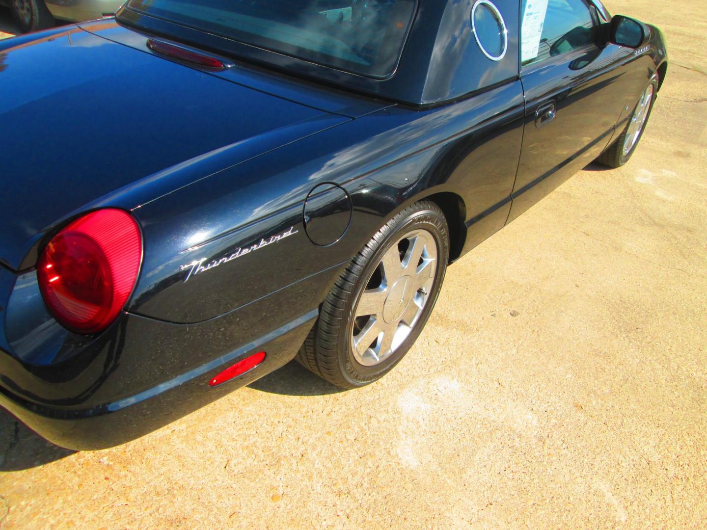 2003 BLACK Ford Thunderbird Deluxe (1FAHP60A13Y) with an 3.9L V8 DOHC 32V engine, 5-Speed Automatic Overdrive transmission, located at 1815 NE 28th St., Fort Worth, TX, 76106, (817) 625-6251, 32.795582, -97.333069 - Photo#4