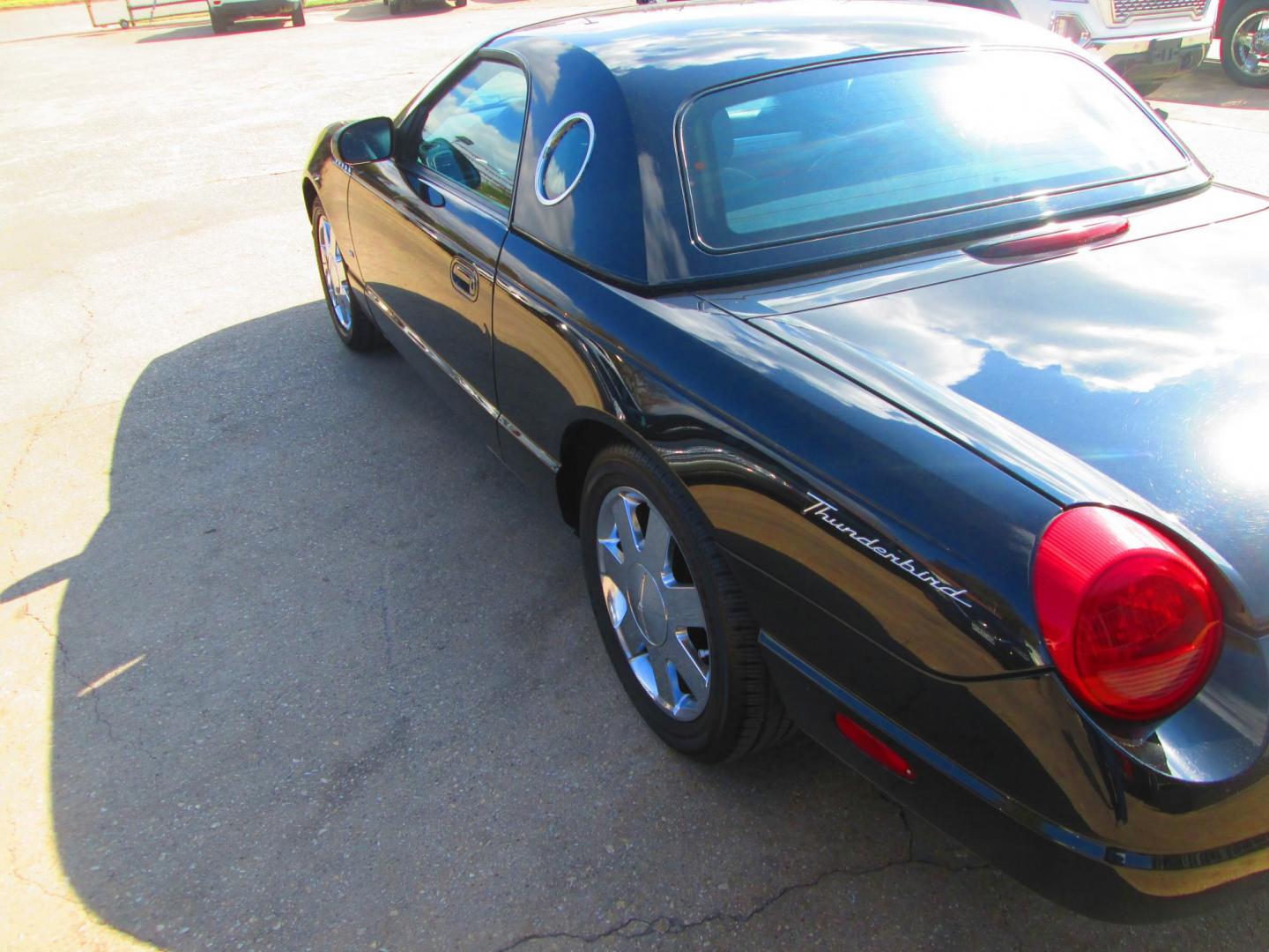 2003 BLACK Ford Thunderbird Deluxe (1FAHP60A13Y) with an 3.9L V8 DOHC 32V engine, 5-Speed Automatic Overdrive transmission, located at 1815 NE 28th St., Fort Worth, TX, 76106, (817) 625-6251, 32.795582, -97.333069 - Photo#6