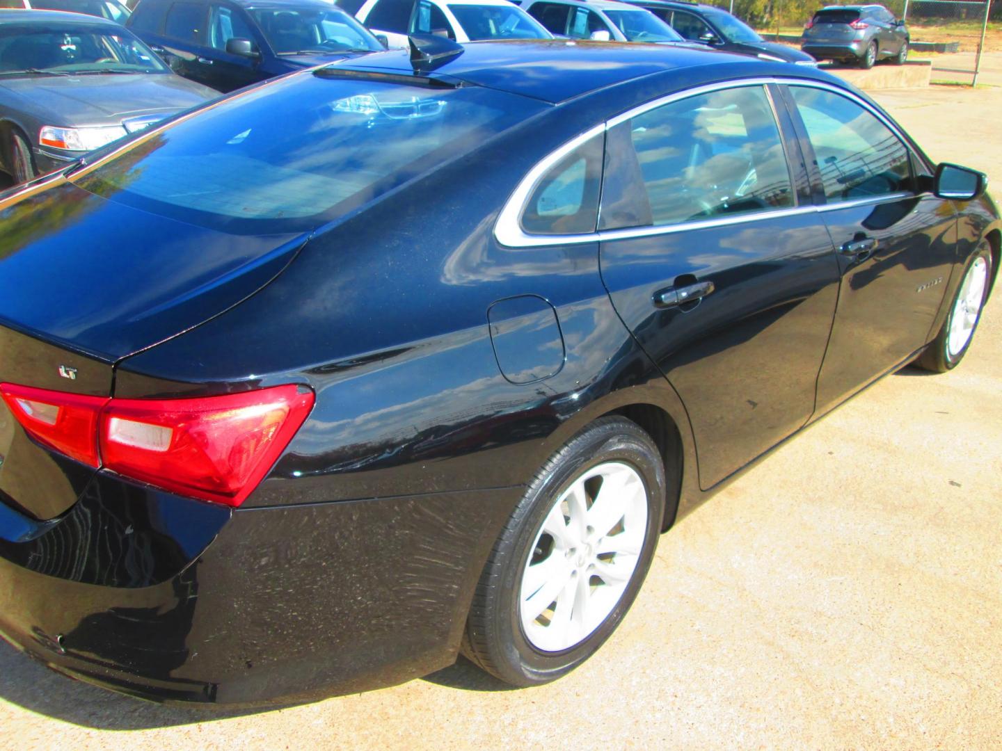 2017 BLACK Chevrolet Malibu 1LT (1G1ZE5ST4HF) with an 1.5L L4 DOHC 16V engine, 6A transmission, located at 1815 NE 28th St., Fort Worth, TX, 76106, (817) 625-6251, 32.795582, -97.333069 - Photo#4