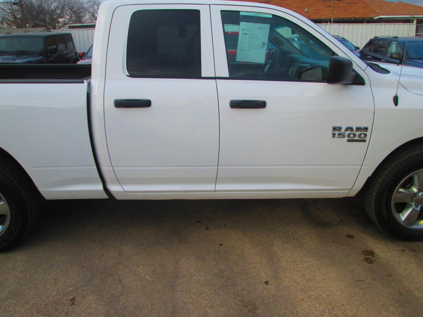 2019 WHITE RAM 1500 Tradesman Quad Cab 4WD (1C6RR7FG7KS) with an 3.6L V6 DOHC 24V FFV engine, 8A transmission, located at 1815 NE 28th St., Fort Worth, TX, 76106, (817) 625-6251, 32.795582, -97.333069 - Photo#3
