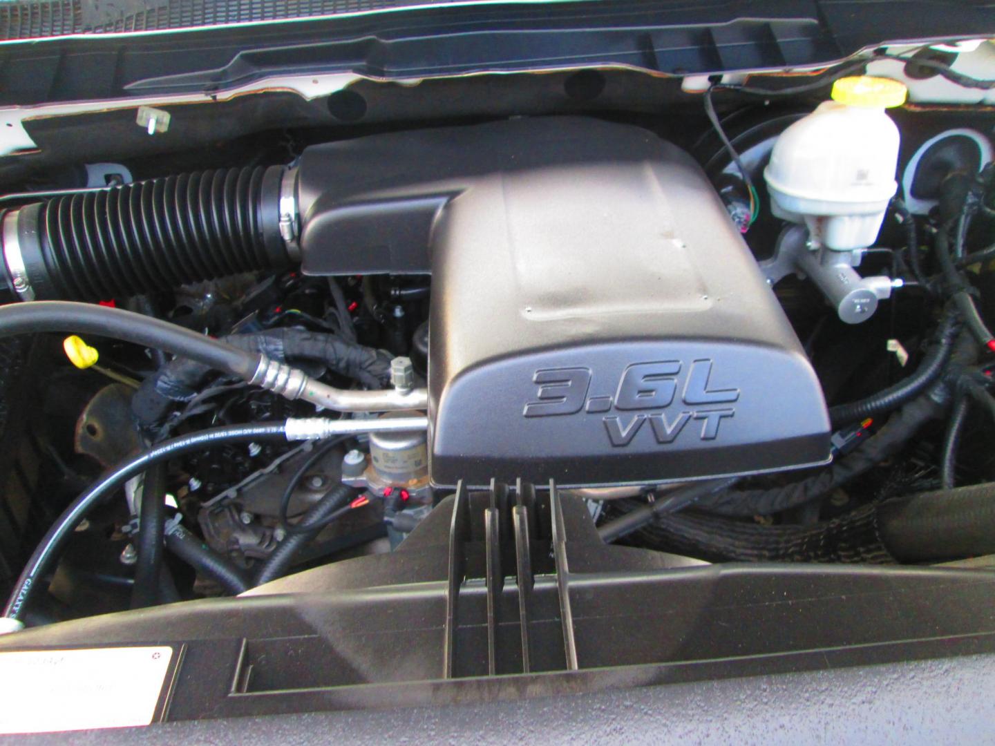 2019 WHITE RAM 1500 Tradesman Quad Cab 4WD (1C6RR7FG7KS) with an 3.6L V6 DOHC 24V FFV engine, 8A transmission, located at 1815 NE 28th St., Fort Worth, TX, 76106, (817) 625-6251, 32.795582, -97.333069 - Photo#12