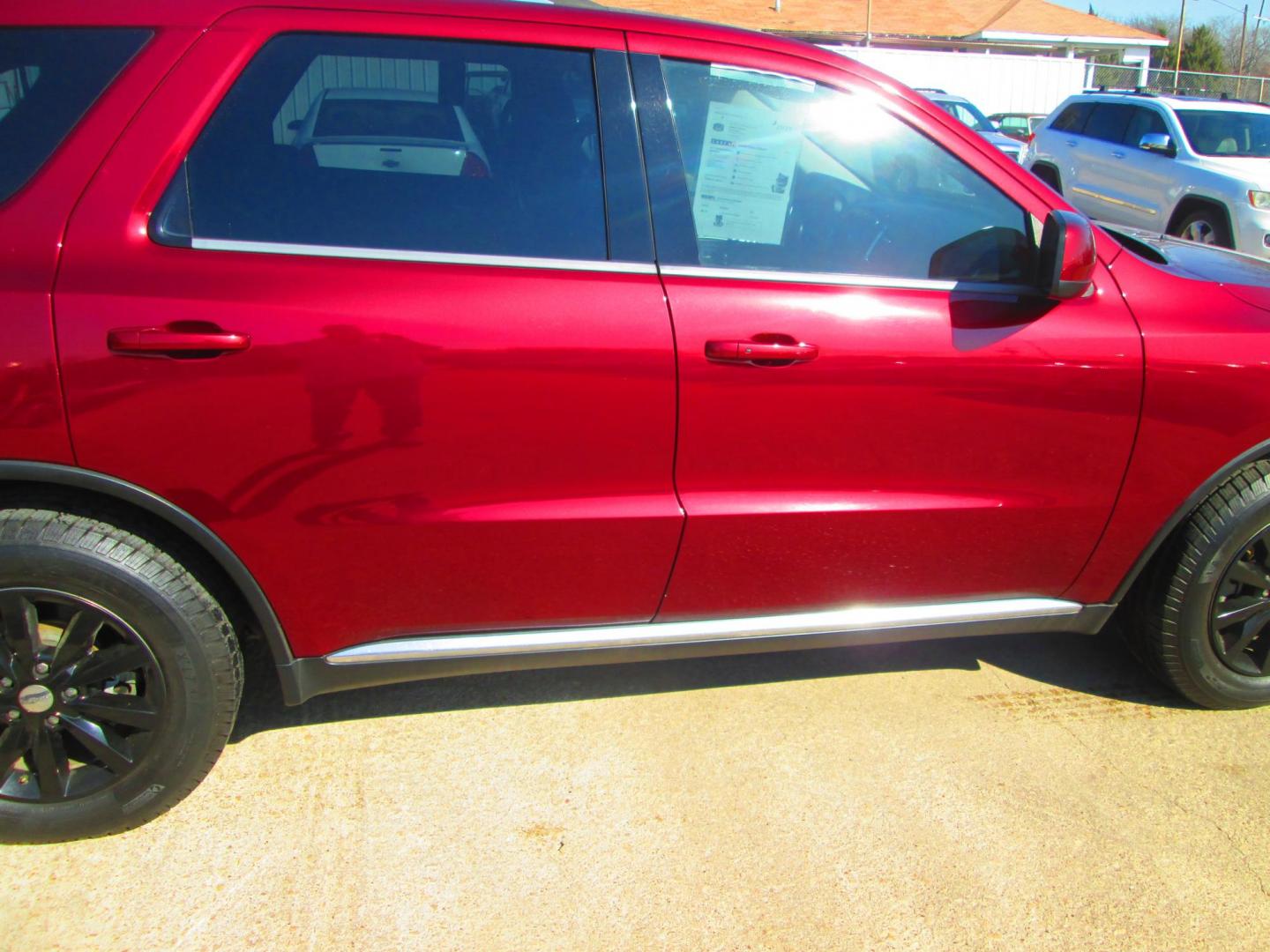 2017 RED Dodge Durango SXT RWD (1C4RDHAG6HC) with an 3.6L V6 DOHC 24V engine, 8A transmission, located at 1815 NE 28th St., Fort Worth, TX, 76106, (817) 625-6251, 32.795582, -97.333069 - Photo#3