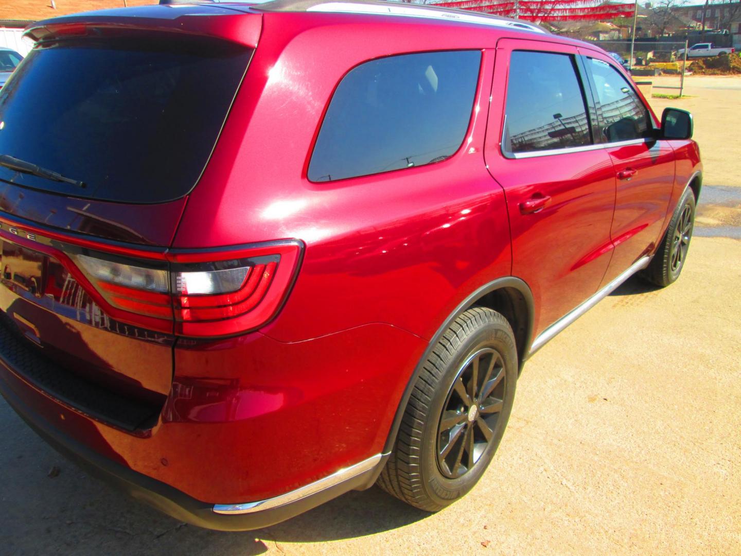 2017 RED Dodge Durango SXT RWD (1C4RDHAG6HC) with an 3.6L V6 DOHC 24V engine, 8A transmission, located at 1815 NE 28th St., Fort Worth, TX, 76106, (817) 625-6251, 32.795582, -97.333069 - Photo#4