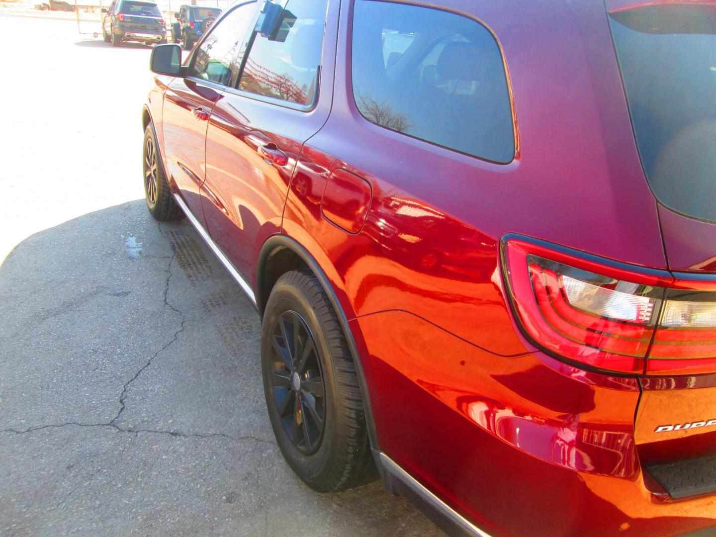 2017 RED Dodge Durango SXT RWD (1C4RDHAG6HC) with an 3.6L V6 DOHC 24V engine, 8A transmission, located at 1815 NE 28th St., Fort Worth, TX, 76106, (817) 625-6251, 32.795582, -97.333069 - Photo#7