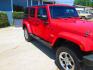 2013 RED Jeep Wrangler Unlimited Sahara 4WD (1C4HJWEG9DL) with an 3.6L V6 DOHC 24V FFV engine, located at 1815 NE 28th St., Fort Worth, TX, 76106, (817) 625-6251, 32.795582, -97.333069 - Photo#2