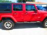 2013 RED Jeep Wrangler Unlimited Sahara 4WD (1C4HJWEG9DL) with an 3.6L V6 DOHC 24V FFV engine, located at 1815 NE 28th St., Fort Worth, TX, 76106, (817) 625-6251, 32.795582, -97.333069 - Photo#3