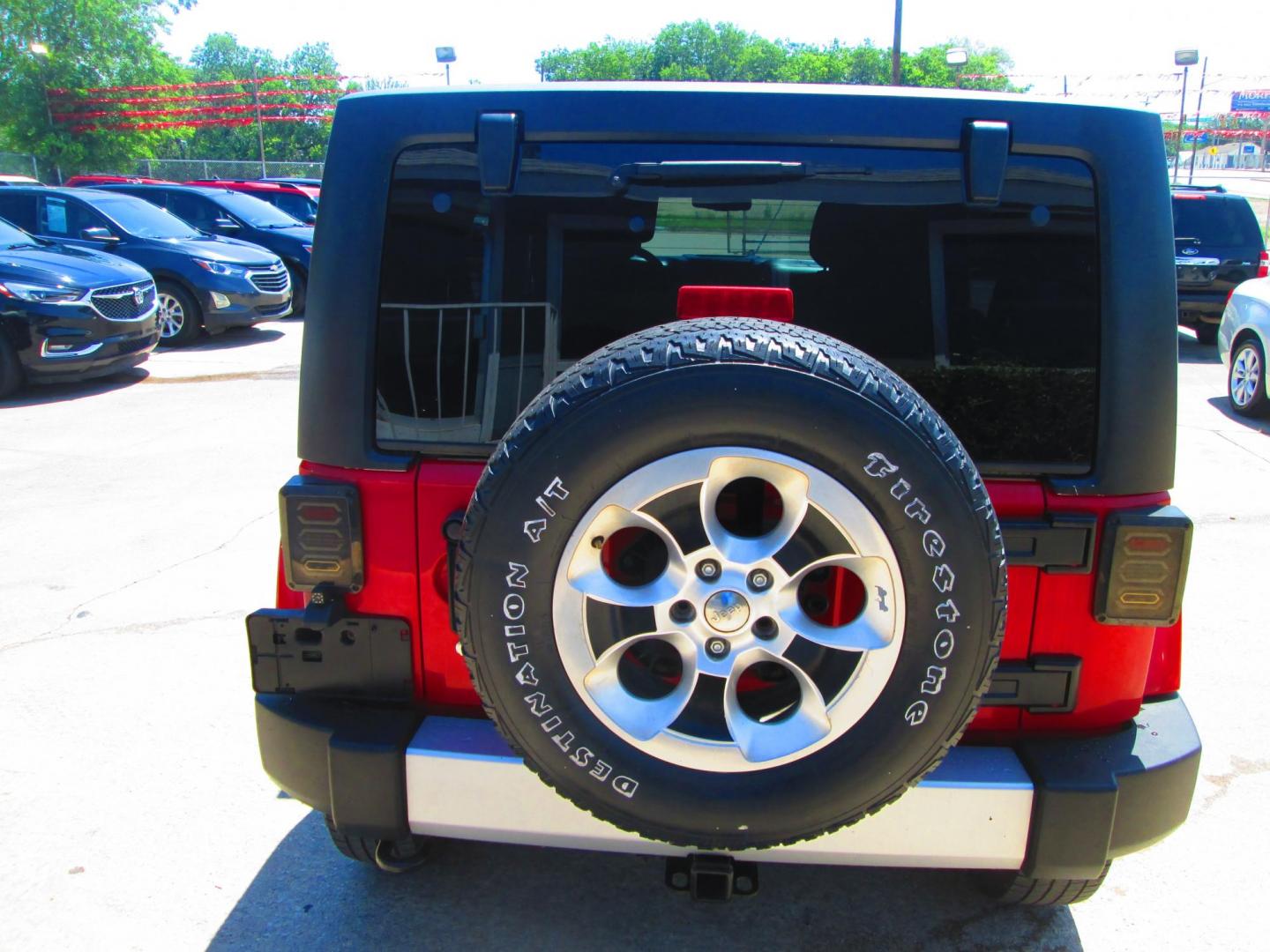 2013 RED Jeep Wrangler Unlimited Sahara 4WD (1C4HJWEG9DL) with an 3.6L V6 DOHC 24V FFV engine, located at 1815 NE 28th St., Fort Worth, TX, 76106, (817) 625-6251, 32.795582, -97.333069 - Photo#5