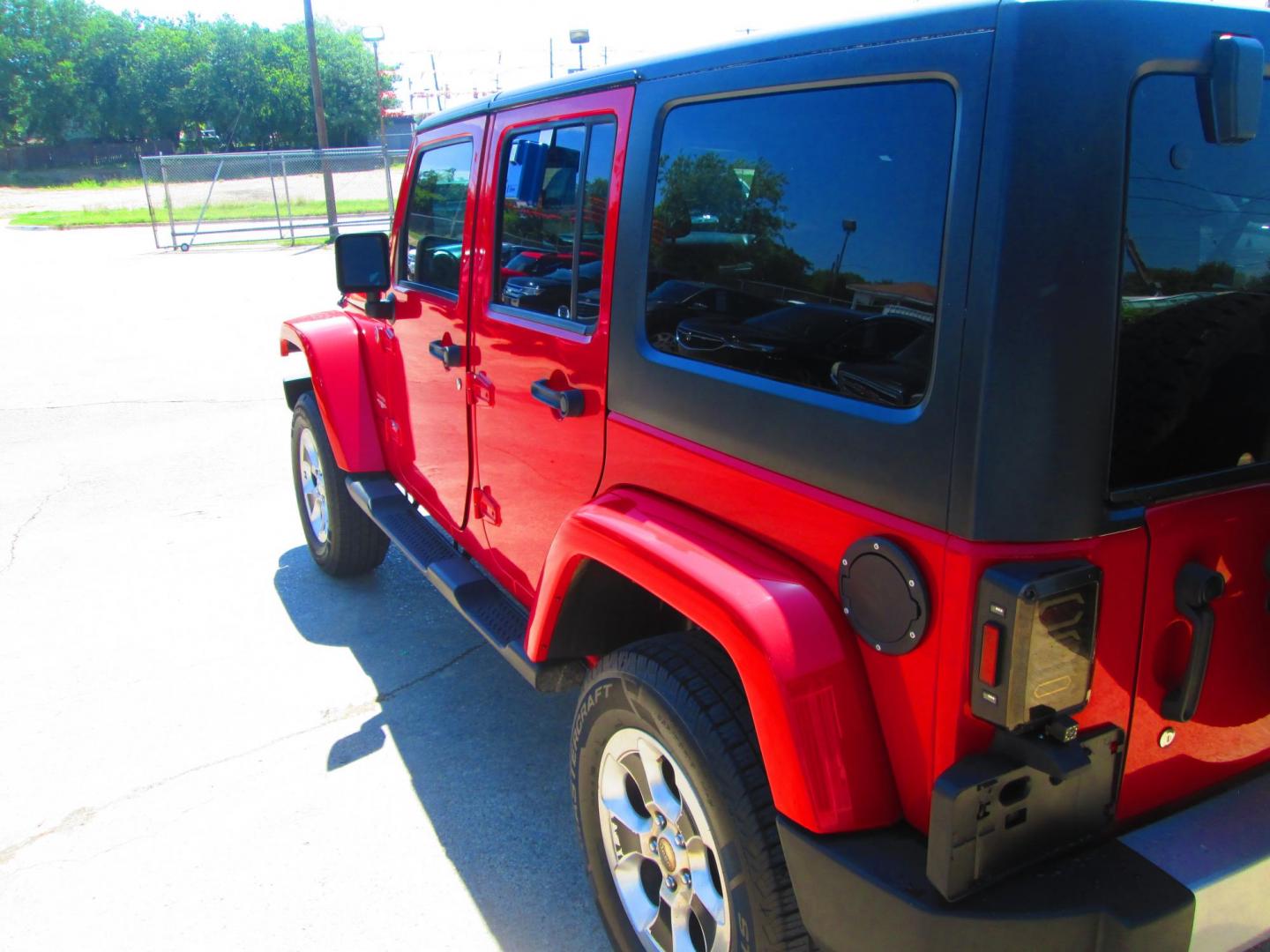 2013 RED Jeep Wrangler Unlimited Sahara 4WD (1C4HJWEG9DL) with an 3.6L V6 DOHC 24V FFV engine, located at 1815 NE 28th St., Fort Worth, TX, 76106, (817) 625-6251, 32.795582, -97.333069 - Photo#6