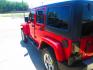 2013 RED Jeep Wrangler Unlimited Sahara 4WD (1C4HJWEG9DL) with an 3.6L V6 DOHC 24V FFV engine, located at 1815 NE 28th St., Fort Worth, TX, 76106, (817) 625-6251, 32.795582, -97.333069 - Photo#6