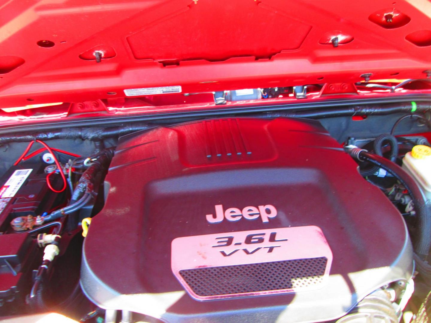 2013 RED Jeep Wrangler Unlimited Sahara 4WD (1C4HJWEG9DL) with an 3.6L V6 DOHC 24V FFV engine, located at 1815 NE 28th St., Fort Worth, TX, 76106, (817) 625-6251, 32.795582, -97.333069 - Photo#11