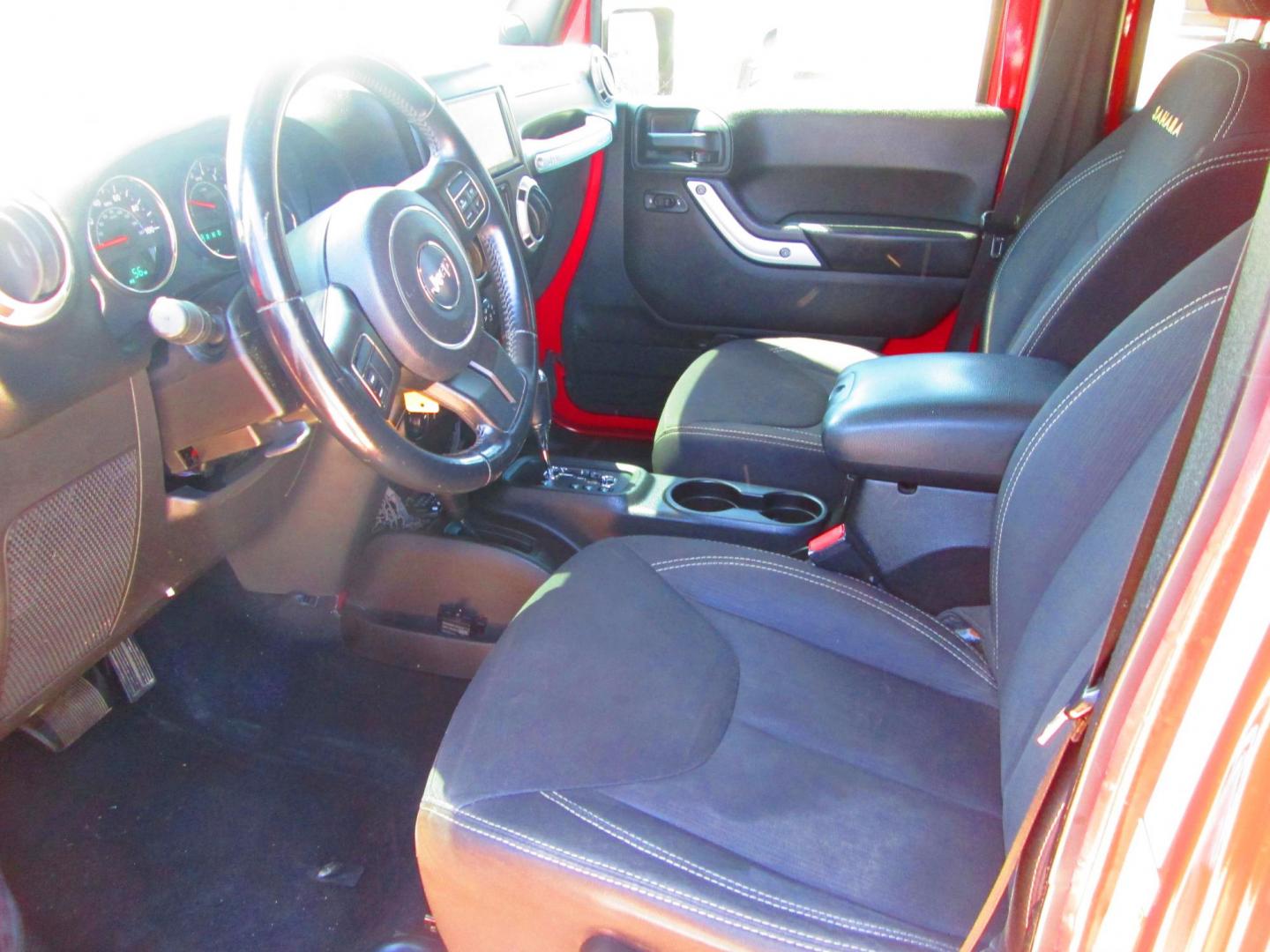 2013 RED Jeep Wrangler Unlimited Sahara 4WD (1C4HJWEG9DL) with an 3.6L V6 DOHC 24V FFV engine, located at 1815 NE 28th St., Fort Worth, TX, 76106, (817) 625-6251, 32.795582, -97.333069 - Photo#10