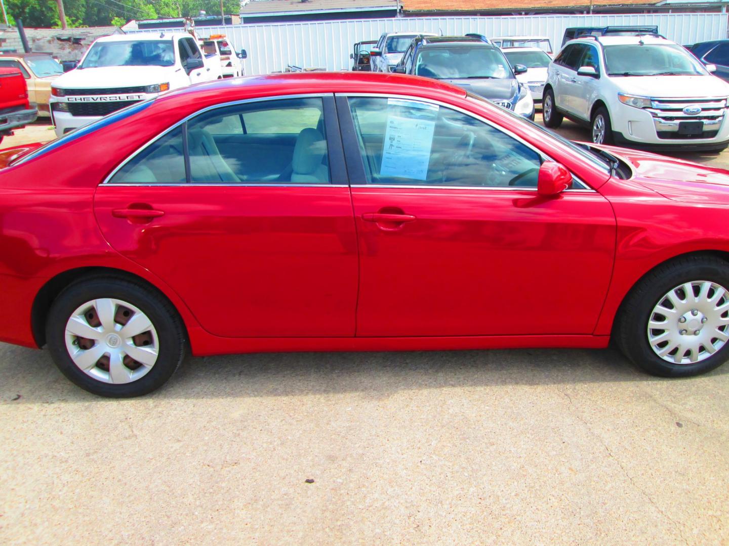 2007 RED Toyota Camry CE 5-Spd AT (4T1BE46K77U) with an 2.4L L4 DOHC 16V engine, 5-Speed Automatic Overdrive transmission, located at 1815 NE 28th St., Fort Worth, TX, 76106, (817) 625-6251, 32.795582, -97.333069 - Photo#3