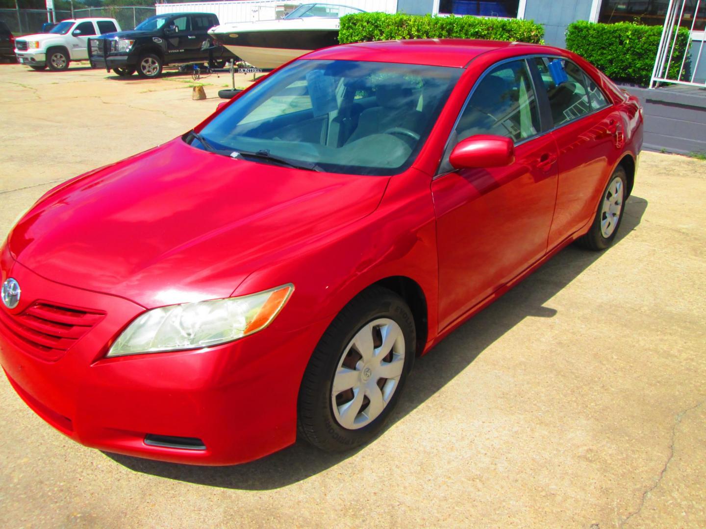 2007 RED Toyota Camry CE 5-Spd AT (4T1BE46K77U) with an 2.4L L4 DOHC 16V engine, 5-Speed Automatic Overdrive transmission, located at 1815 NE 28th St., Fort Worth, TX, 76106, (817) 625-6251, 32.795582, -97.333069 - Photo#0