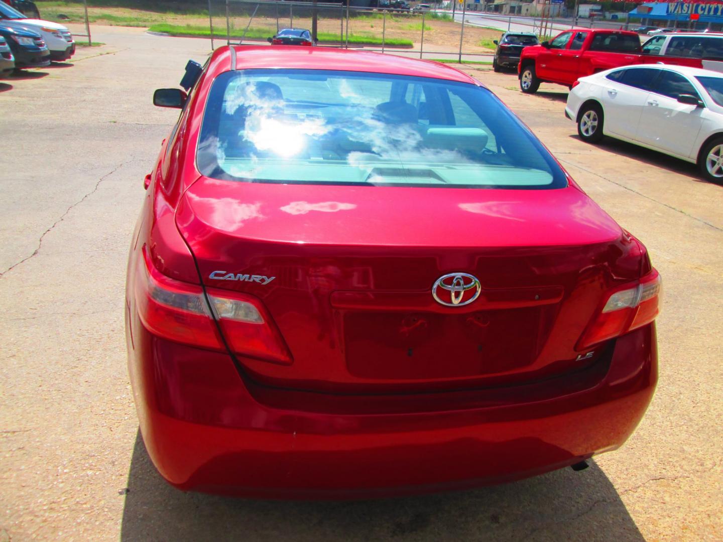 2007 RED Toyota Camry CE 5-Spd AT (4T1BE46K77U) with an 2.4L L4 DOHC 16V engine, 5-Speed Automatic Overdrive transmission, located at 1815 NE 28th St., Fort Worth, TX, 76106, (817) 625-6251, 32.795582, -97.333069 - Photo#5
