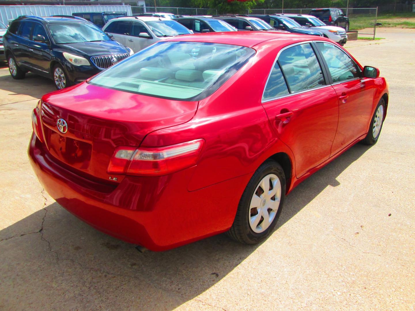 2007 RED Toyota Camry CE 5-Spd AT (4T1BE46K77U) with an 2.4L L4 DOHC 16V engine, 5-Speed Automatic Overdrive transmission, located at 1815 NE 28th St., Fort Worth, TX, 76106, (817) 625-6251, 32.795582, -97.333069 - Photo#4