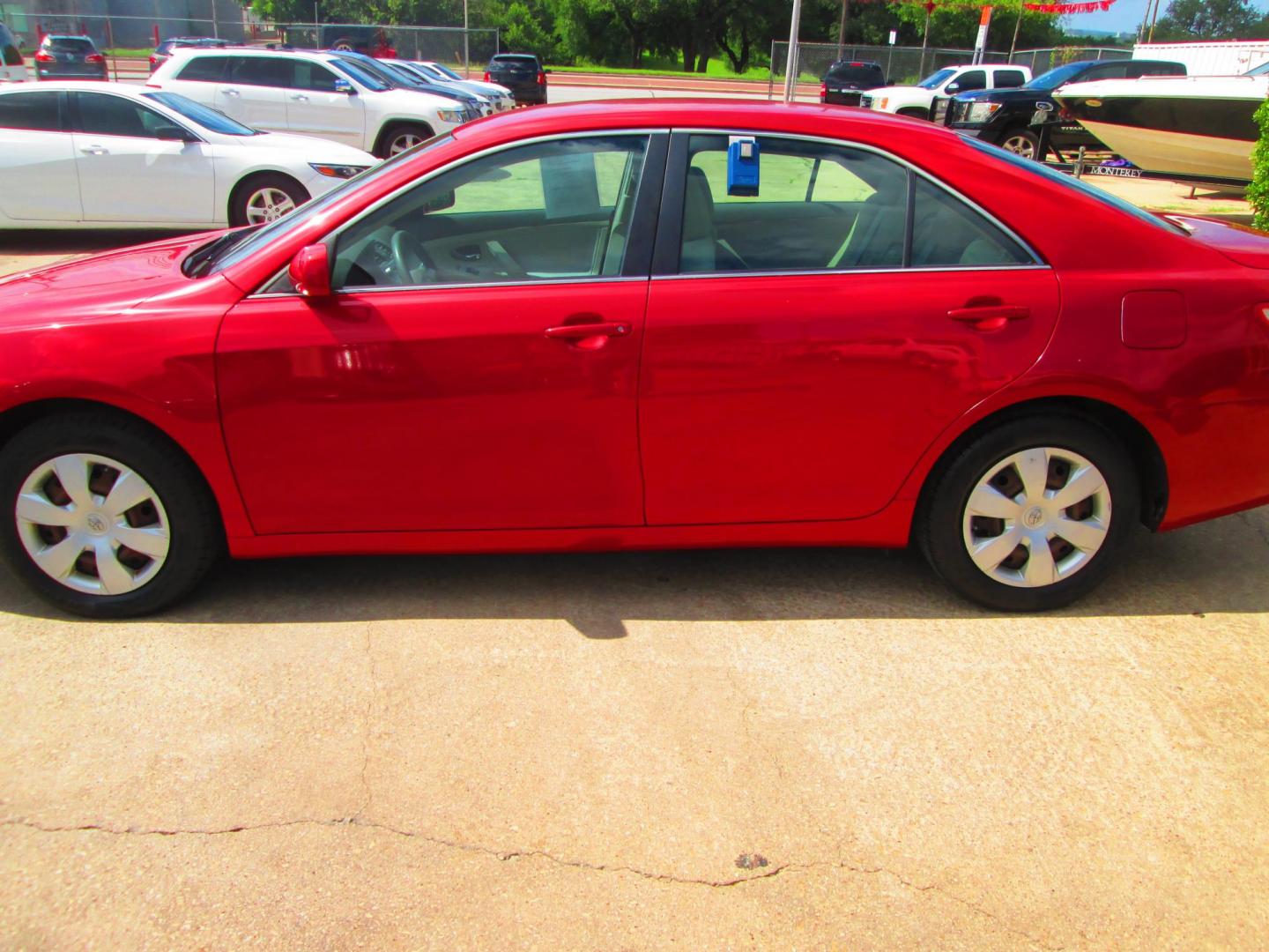 2007 RED Toyota Camry CE 5-Spd AT (4T1BE46K77U) with an 2.4L L4 DOHC 16V engine, 5-Speed Automatic Overdrive transmission, located at 1815 NE 28th St., Fort Worth, TX, 76106, (817) 625-6251, 32.795582, -97.333069 - Photo#7
