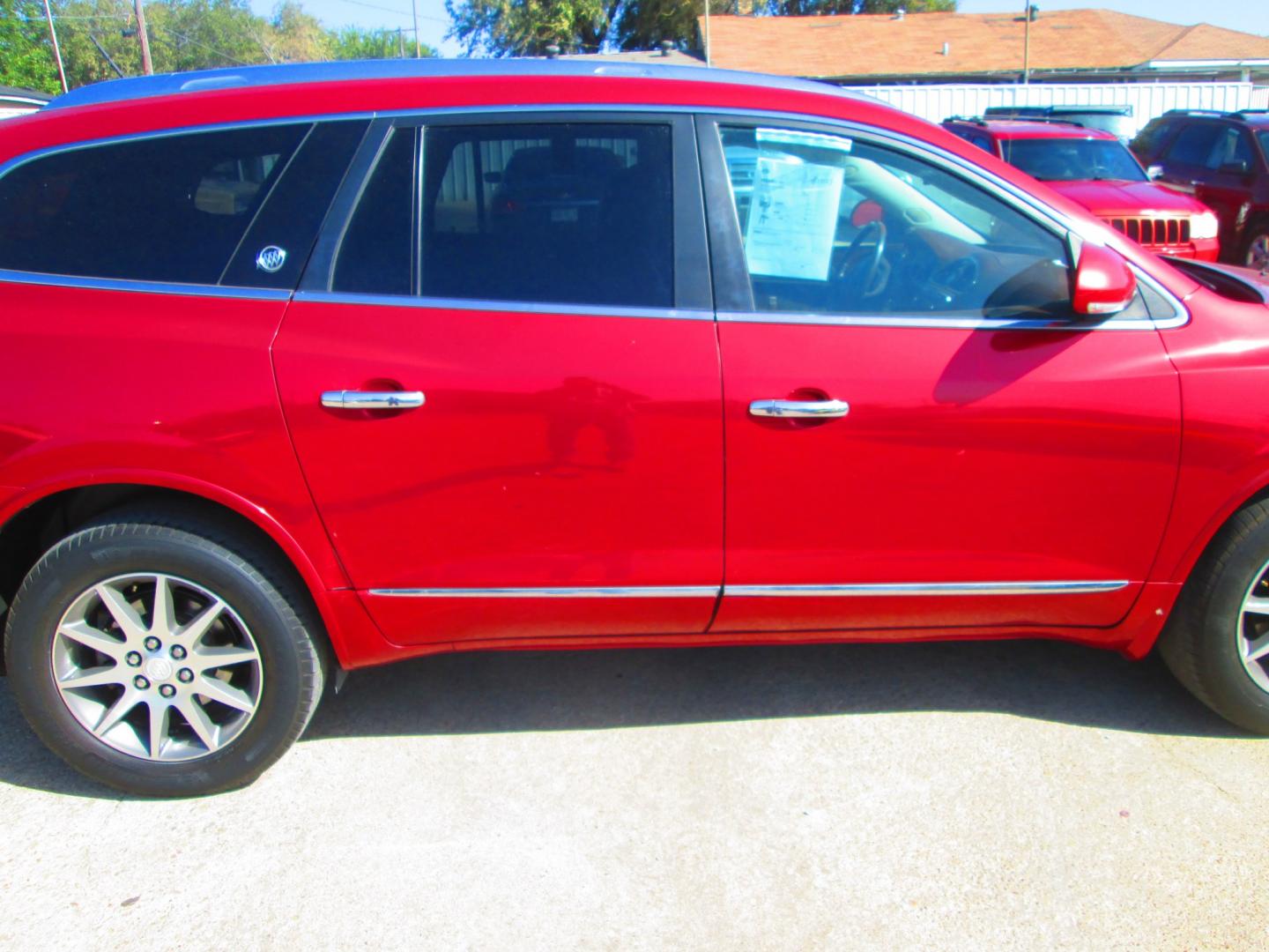2013 RED Buick Enclave Leather FWD (5GAKRCKD7DJ) with an 3.6L V6 DOHC 24V engine, 6-Speed Automatic Overdrive transmission, located at 1815 NE 28th St., Fort Worth, TX, 76106, (817) 625-6251, 32.795582, -97.333069- Photo#3
