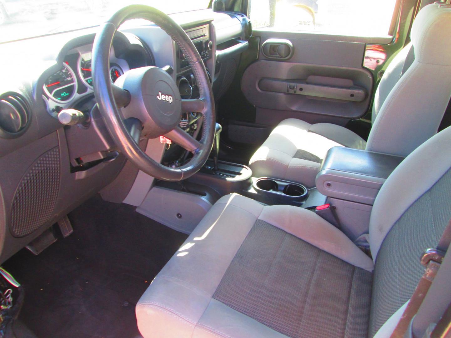 2010 GREEN Jeep Wrangler Sport 4WD (1J4AA2D12AL) with an 3.8L V6 OHV 12V engine, located at 1815 NE 28th St., Fort Worth, TX, 76106, (817) 625-6251, 32.795582, -97.333069- Photo#8