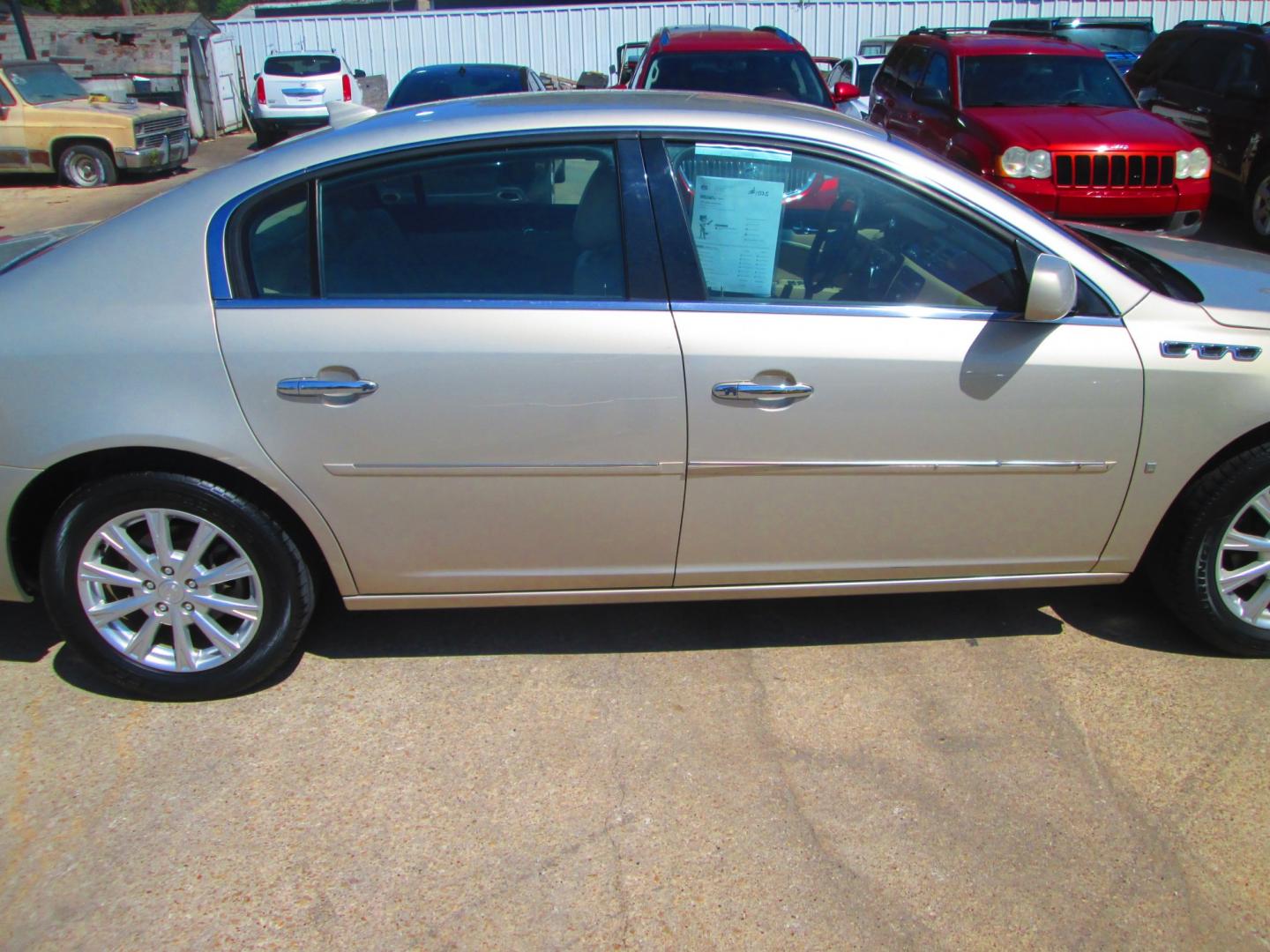 2009 GOLD Buick Lucerne CXL1 (1G4HD57M79U) with an 3.9L V6 OHV 12V engine, 4A transmission, located at 1815 NE 28th St., Fort Worth, TX, 76106, (817) 625-6251, 32.795582, -97.333069- Photo#3