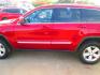 2012 RED Jeep Grand Cherokee Laredo 2WD (1C4RJEATXCC) with an 5.7L V8 OHV 16V engine, 5-Speed Automatic transmission, located at 1815 NE 28th St., Fort Worth, TX, 76106, (817) 625-6251, 32.795582, -97.333069- Photo#7