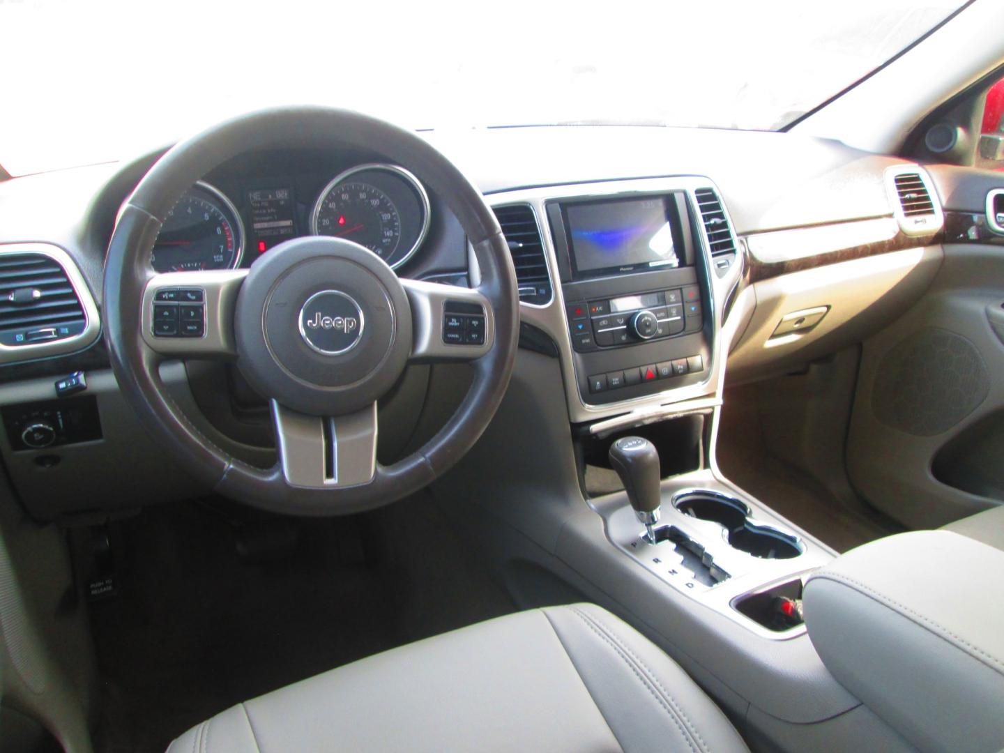 2012 RED Jeep Grand Cherokee Laredo 2WD (1C4RJEATXCC) with an 5.7L V8 OHV 16V engine, 5-Speed Automatic transmission, located at 1815 NE 28th St., Fort Worth, TX, 76106, (817) 625-6251, 32.795582, -97.333069- Photo#9